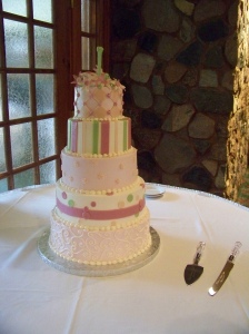 Wedding cake accenting her bridal colors